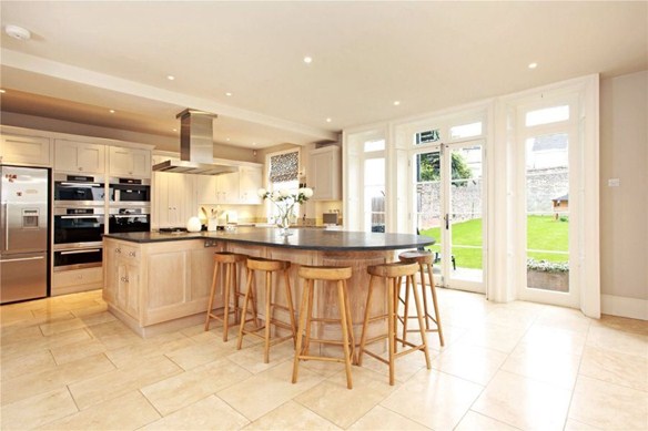 Spacious and practical, the beautiful kitchen is modern.