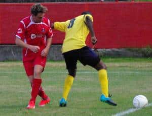 HOLDING ROLE Tunbridge Wells battle for the ball against Croydon 
