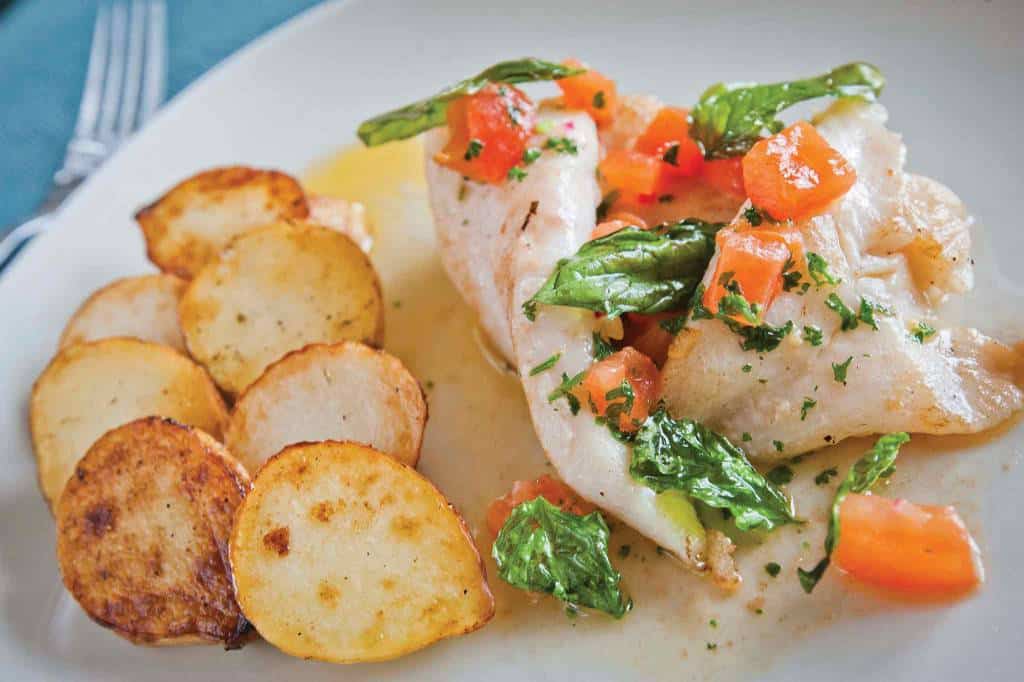 Cod (or Pollock) with herb and tomato butter