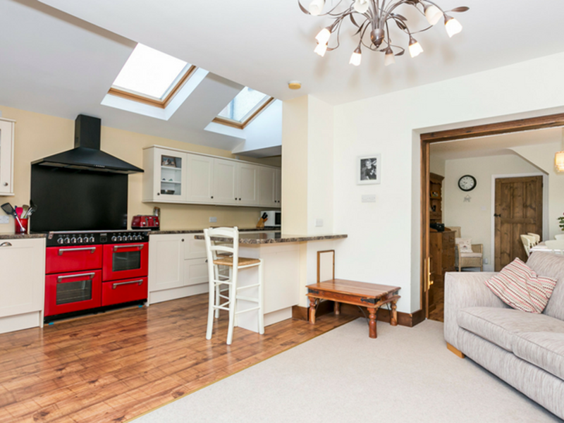 Spacious and practical, the beautiful kitchen is modern.