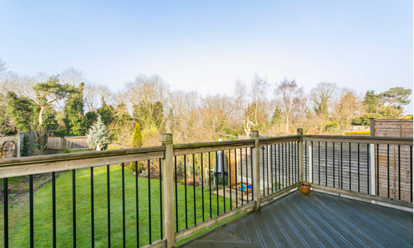 A terrace looks out over the extensive garden